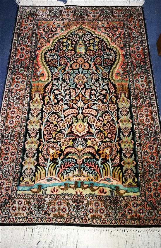 A Kashan print silk rug 124cm x 79cm